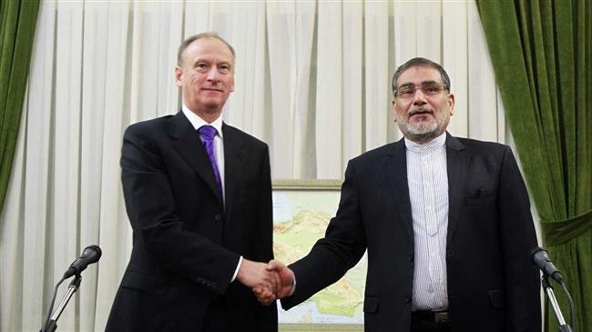 Nikolai Patruschev y Ali Shamjani