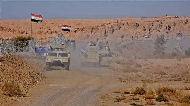 Milicias del Hashid al Shaabi junto a la frontera siria