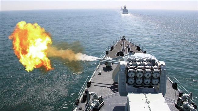 barcos-chinos-uno-disparando